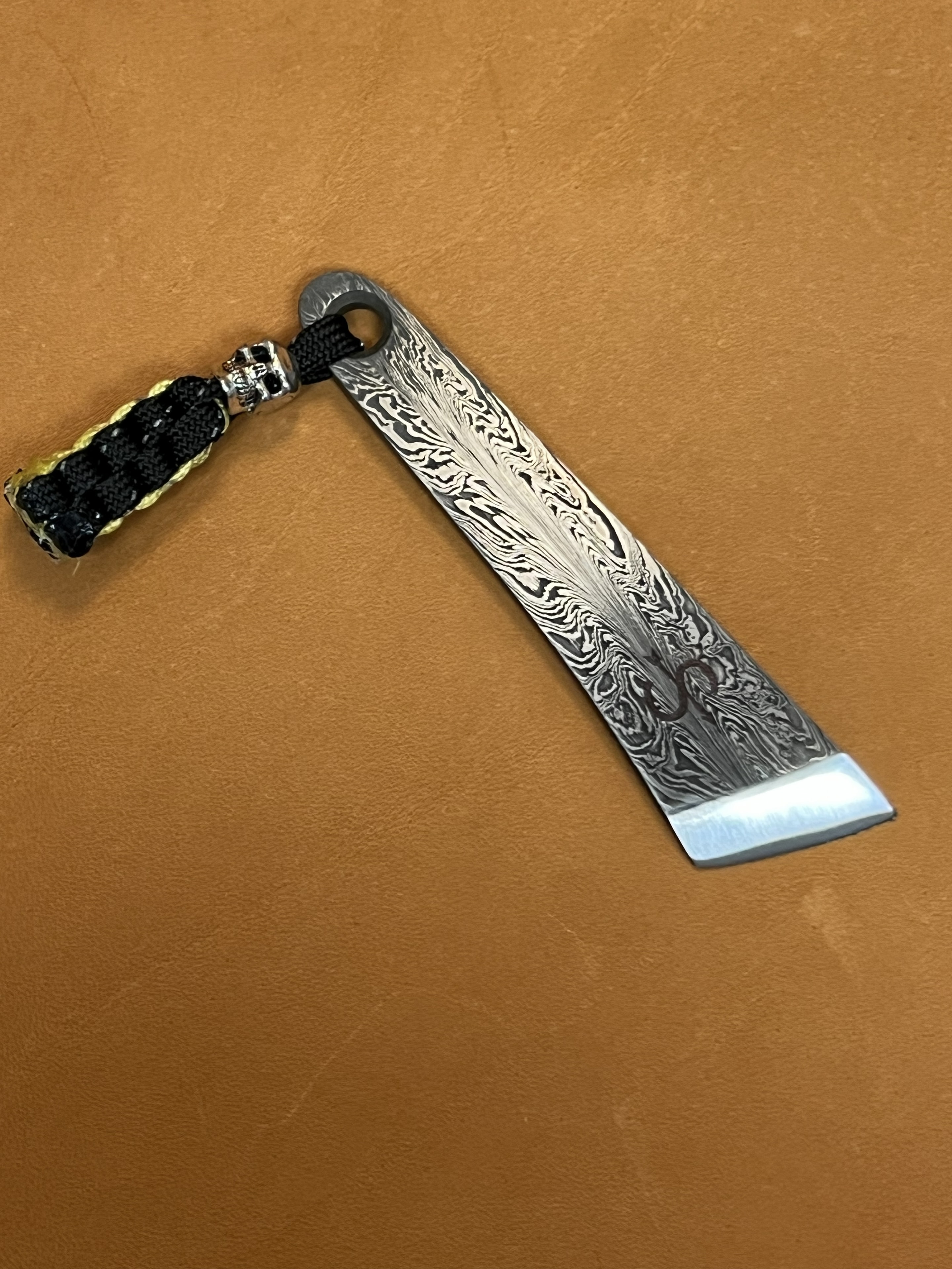 Damascus cleaver-style blade with paracord handle
