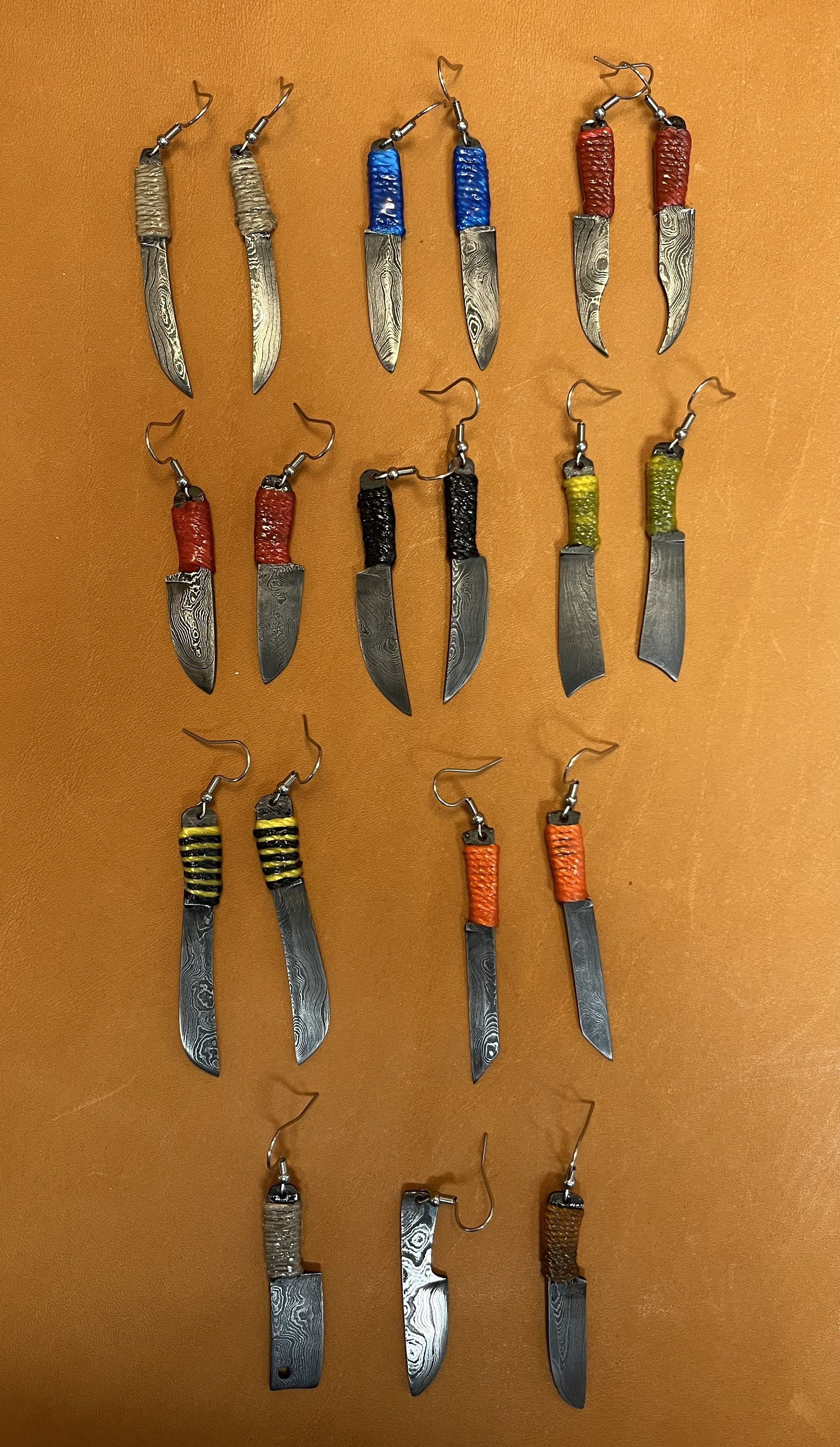Handcrafted Damascus knife earrings in assorted colors