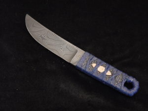 Forged blade — handle scales